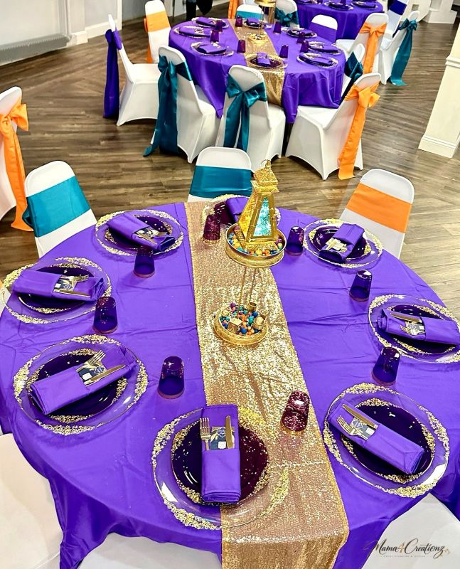 Gold sequin drape with lanterns and a Moroccan theme
